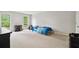 Bedroom with carpet, a bed, a desk in front of a window with natural light at 4960 Tadmore Ln, Lithonia, GA 30038