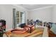 Inviting bedroom with bright natural light, colorful accent rug, and ample space for personalization at 4960 Tadmore Ln, Lithonia, GA 30038
