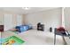 This bright bedroom offers ample space and natural light from its large window at 4960 Tadmore Ln, Lithonia, GA 30038