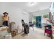 Bright bedroom with a large desk and windows allowing ample natural light at 4960 Tadmore Ln, Lithonia, GA 30038