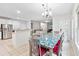 Eat-in kitchen adjacent to a dining area and living room, perfect for entertaining at 4960 Tadmore Ln, Lithonia, GA 30038