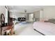 Open-concept living space with cozy seating and seamless flow between the living and sleeping areas at 4960 Tadmore Ln, Lithonia, GA 30038