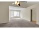 Bright bedroom featuring a vaulted ceiling, ceiling fan, and neutral paint, offering a relaxing atmosphere at 5320 Taylor Rd, Alpharetta, GA 30022