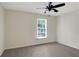 Comfortable bedroom with a window, providing a tranquil and airy atmosphere at 5320 Taylor Rd, Alpharetta, GA 30022