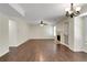 Open-concept living room area with fireplace and natural lighting at 5320 Taylor Rd, Alpharetta, GA 30022