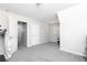Neutrally painted bedroom featuring carpeted floors and overhead lighting at 2412 Wingfield Dr, Austell, GA 30106