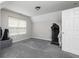 Neutral bedroom featuring plush carpet and a large closet. Bathed in natural light at 2412 Wingfield Dr, Austell, GA 30106