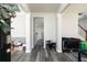 Open foyer featuring gray wood-look floors and white trim details at 2412 Wingfield Dr, Austell, GA 30106