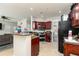 Open kitchen featuring granite countertops, stainless steel appliances and an island with seating at 2412 Wingfield Dr, Austell, GA 30106