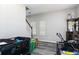 Neutral living area with hardwood floors, staircase, cabinet, and natural light at 2412 Wingfield Dr, Austell, GA 30106