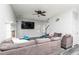 Open living room with gray wood-look floors and a brick fireplace at 2412 Wingfield Dr, Austell, GA 30106