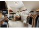 Spacious walk-in closet with custom shelving and ample storage for clothes, shoes, and accessories at 2660 Burnt Hickory Dr, Cumming, GA 30028