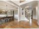 Spacious foyer with hardwood floors leading to the dining room and staircase, complete with elegant moldings and millwork at 2660 Burnt Hickory Dr, Cumming, GA 30028