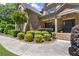 Charming front porch with well-manicured landscaping and a welcoming entrance at 2660 Burnt Hickory Dr, Cumming, GA 30028
