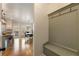Functional mud room including seating and hooks adjacent to bright eat-in kitchen at 2660 Burnt Hickory Dr, Cumming, GA 30028