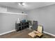 Unfinished storage space in the basement with shelving, boxes and dark grey paint at 526 Lakeside Dr, Hiram, GA 30141