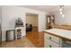 Open concept kitchen featuring stainless appliances, breakfast bar, and smooth flow into dining area at 6637 Oak Farm Se Dr, Acworth, GA 30102