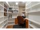 Functional office space with built-in shelves and desk area, perfect for remote work or study at 6637 Oak Farm Se Dr, Acworth, GA 30102