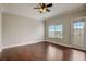 Spacious bedroom featuring hardwood floors and a large window with great natural light at 2161 Peachtree Rd # Apt 706, Atlanta, GA 30309