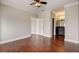 Bedroom featuring wood floors, crown molding, and a full ensuite bathroom at 2161 Peachtree Rd # Apt 706, Atlanta, GA 30309