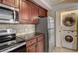 Updated kitchen with stainless steel appliances and an in-unit washer/dryer at 2161 Peachtree Rd # Apt 706, Atlanta, GA 30309