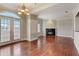 Inviting living room with French doors, fireplace, and hardwood floors at 2161 Peachtree Rd # Apt 706, Atlanta, GA 30309