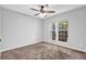 Cozy bedroom with neutral carpet and lots of natural light from a window at 3020 Meadow Glen Pass, Fairburn, GA 30213
