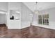 Bright dining room with hardwood floors, chair rail, and chandelier at 3020 Meadow Glen Pass, Fairburn, GA 30213