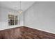 Dining room with natural light and hardwood floors at 3020 Meadow Glen Pass, Fairburn, GA 30213