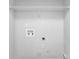 The laundry room has white walls and utility hookups at 3020 Meadow Glen Pass, Fairburn, GA 30213