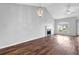 Living room features high ceilings, fireplace, large windows and hardwood floors at 3020 Meadow Glen Pass, Fairburn, GA 30213