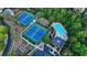 Aerial view of community amenities featuring a pool, tennis courts, clubhouse, and playground at 3302 Anna Ruby Ln, Buford, GA 30519