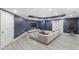 Spacious finished basement area offering plenty of seating and room for activities and entertainment at 3302 Anna Ruby Ln, Buford, GA 30519