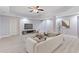 Finished basement with modern furniture and a flat screen television at 3302 Anna Ruby Ln, Buford, GA 30519