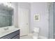 Simple bathroom featuring a shower over tub and modern fixtures at 3302 Anna Ruby Ln, Buford, GA 30519