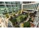 An aerial view captures this community's common area, featuring a manicured lawn, walkways, and outdoor seating at 40 12Th Ne St # 1406, Atlanta, GA 30309