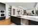 Modern kitchen with an island, stainless steel appliances, and hardwood floors at 40 12Th Ne St # 1406, Atlanta, GA 30309