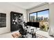 Bright office with large windows offering stunning city views, executive desk setup, and modern furnishings at 40 12Th Ne St # 1406, Atlanta, GA 30309