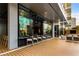 Open outdoor seating with bar, seating, TV and city views at 40 12Th Ne St # 1406, Atlanta, GA 30309
