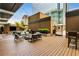 Contemporary patio offers comfortable seating, a TV, grill, and lots of space for entertaining friends and Gathering at 40 12Th Ne St # 1406, Atlanta, GA 30309