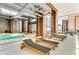 Indoor pool with lounge chairs and floor to ceiling windows at 40 12Th Ne St # 1406, Atlanta, GA 30309