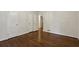 This bedroom features gleaming hardwood floors, bright light, and access to other rooms at 4708 Tall Pines Nw Dr, Atlanta, GA 30327