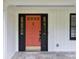 Close-up of a front door with sidelights and transom window at 4708 Tall Pines Nw Dr, Atlanta, GA 30327