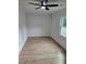 Bedroom with hardwood floors, a ceiling fan, and natural light from the window at 775 Lee Andrews Se Ave, Atlanta, GA 30315