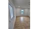 Neutral bedroom with hardwood floors, recessed lighting, and natural light from the window at 775 Lee Andrews Se Ave, Atlanta, GA 30315