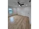 Bright bedroom with wood laminate flooring and a modern ceiling fan at 775 Lee Andrews Se Ave, Atlanta, GA 30315