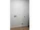 Utility room with laminate floors and hookups for appliances at 775 Lee Andrews Se Ave, Atlanta, GA 30315
