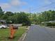 Street view with a mail box that reads 775, as well as a line of trees at 775 Lee Andrews Se Ave, Atlanta, GA 30315