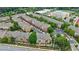 Aerial view of the Alderwood community with brick townhomes and mature landscaping at 359 Alderwood Ln, Atlanta, GA 30328