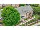 Aerial view of a well-maintained townhome with a gray roof and manicured landscaping at 359 Alderwood Ln, Atlanta, GA 30328